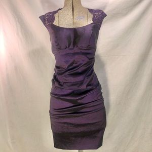 Purple occasion dress.
